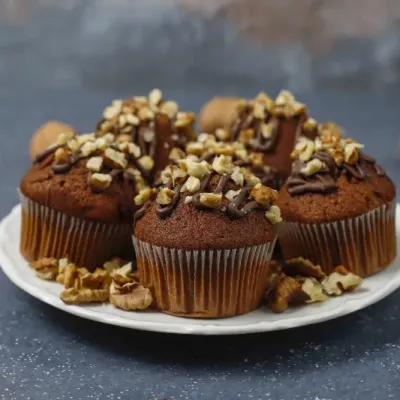Chocolate Walnut Muffins With Coffee Cup With Walnuts Dark Surface