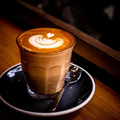 Cup Coffee Latte Top View With Leaf Shape Foam